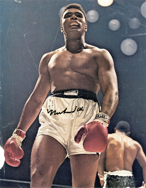 Muhammad Ali 9” x 11” Signed Book Photograph (Beckett/BAS Guaranteed) 