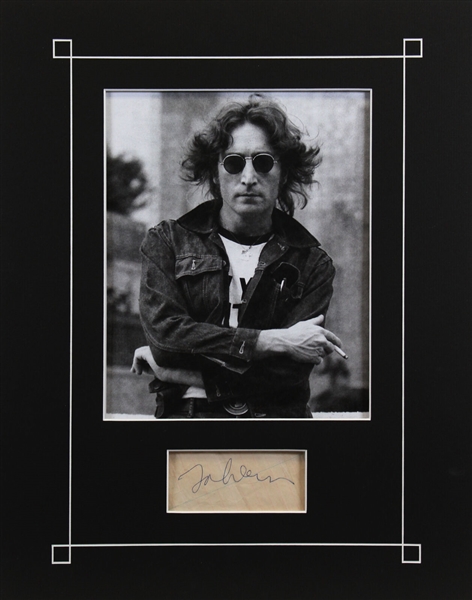 The Beatles: John Lennon Signed Sheet in Custom Matted Display (Caiazzo & Beckett/BAS LOAs)
