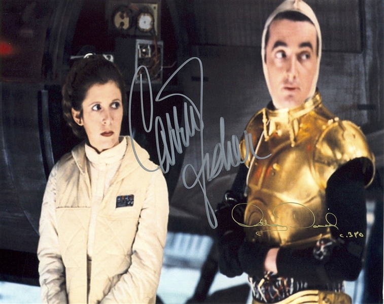 Star Wars: Carrie Fisher & Anthony Daniels 10” x 8” Signed Photo from “The Empire Strikes Back” (Beckett/BAS Guaranteed)