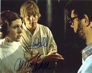 Star Wars: Mark Hamill & Carrie Fisher Dual-Signed Behind-The-Scenes 10” x 8” Photo from “A New Hope” (Beckett/BAS Guaranteed)