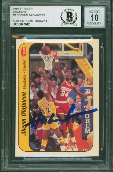 Hakeem Olajuwon Signed 1986 Fleer Stickers Rookie with GEM MINT 10 Autograph (Beckett/BAS Encapsulated)