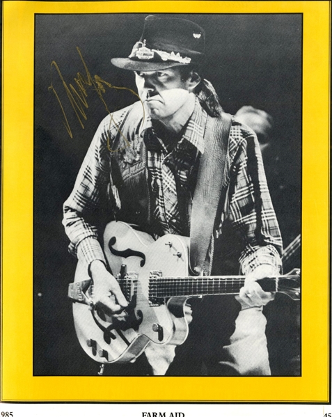 Neil Young Signed 1st Farm Aid Program From 1985 (ACOA Authentication)