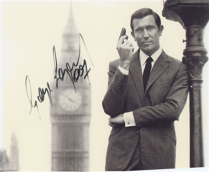 James Bond: George Lazenby Signed 8” x 6.5” Photo (Third Party Guaranteed)