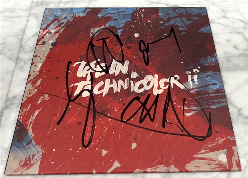 Coldplay Group Signed “Life in Technicolor” 7” Record (4 Sigs) (Beckett/BAS LOA)