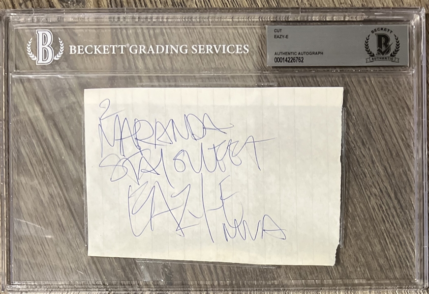 Eazy-E Superb Signed & Inscribed Sheet with "NWA" Inscription (Beckett/BAS Encapsulated & BAS LOA)