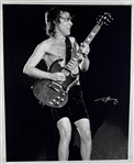 AC/DC: Angus Young Signed 16" x 20" Photo (Epperson/REAL LOA)