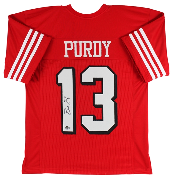 Brock Purdy Signed Red Pro Style Jersey w/ Drop Shadow (Beckett/BAS Witnessed)