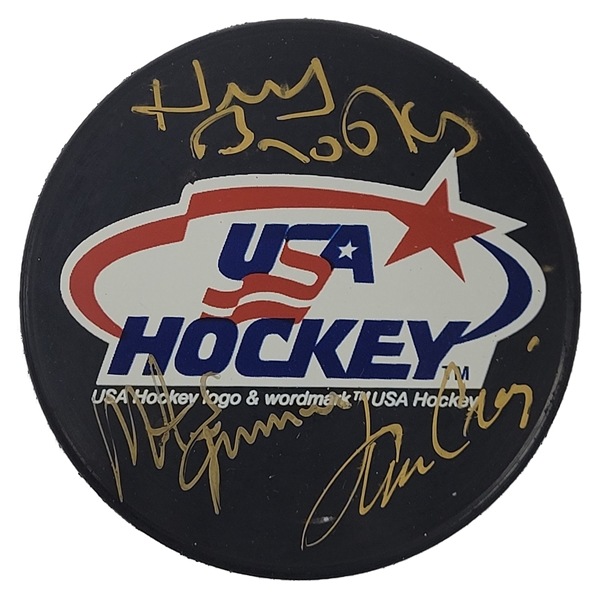 Herb Brooks, Mike Eruzione & Jim Craig Signed Hockey Puck - 1980 USA Olympic Hockey Gold Medal "Miracle on Ice" Winners (Beckett Authentication)