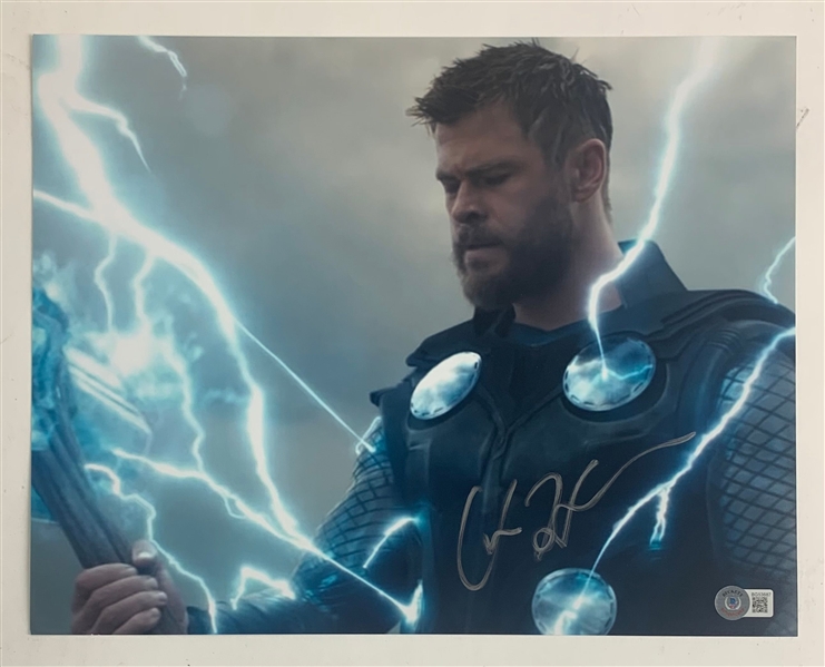 Thor: Chris Hemsworth Signed 11" x 14" Photo (Beckett/BAS)