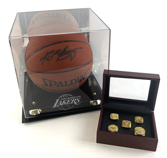 Kobe Bryant Autographed Spalding Basketball & 5 Replica Championship Rings w/ Display Casing (PSA/DNA)