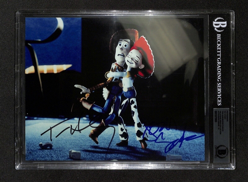 Toy Story 2: Tom Hanks & Joan Cusak Dual Signed 8" x 10" Color Photo w/ Gem Mint 10 Auto! (Beckett/BAS Encapsulated)(Grad Collection)