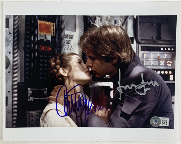 Star Wars: Carrie Fisher & Harrison Ford Dual-Signed 8" x 10" ESB Kiss Scene Photograph (Beckett/BAS LOA)