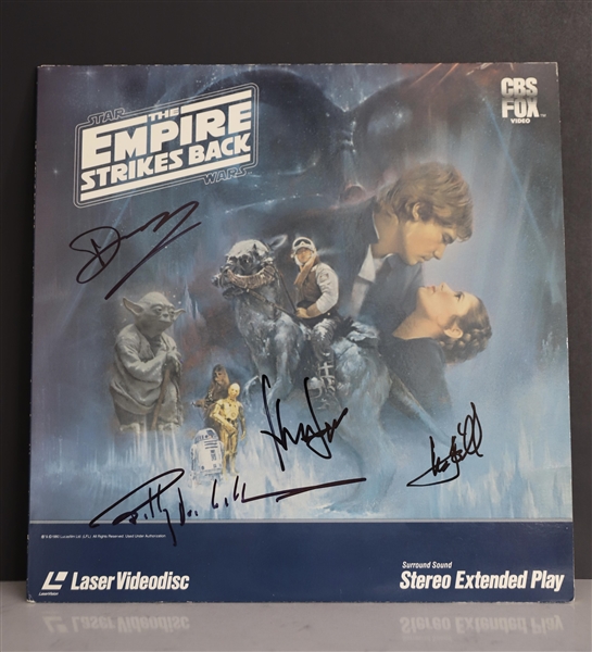 Star Wars: The Empire Strikes Back Cast Signed Laserdisc Cover with Ford, Hamill, Williams and Roy (Third Party Guaranteed)