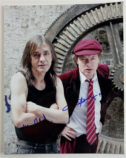 AC/DC: Angus & Malcolm Young Signed 8" x 10" Color Photo (Beckett/BAS)