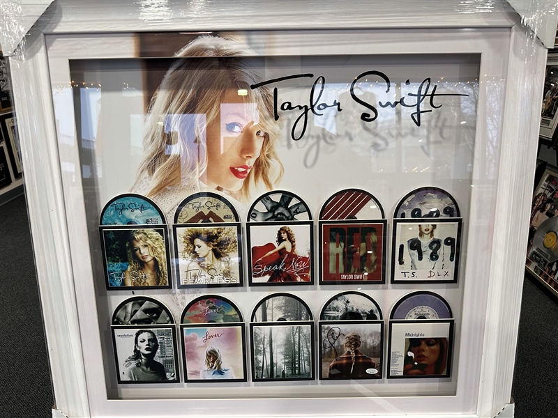 Taylor Swift Signed Evermore CD Insert in Impressive Music Career Display (JSA)