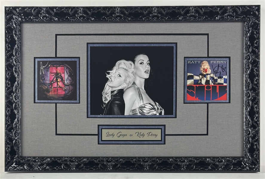 Lady Gaga & Katy Perry Signed CD Inserts in Framed Display (JSA Guaranteed)