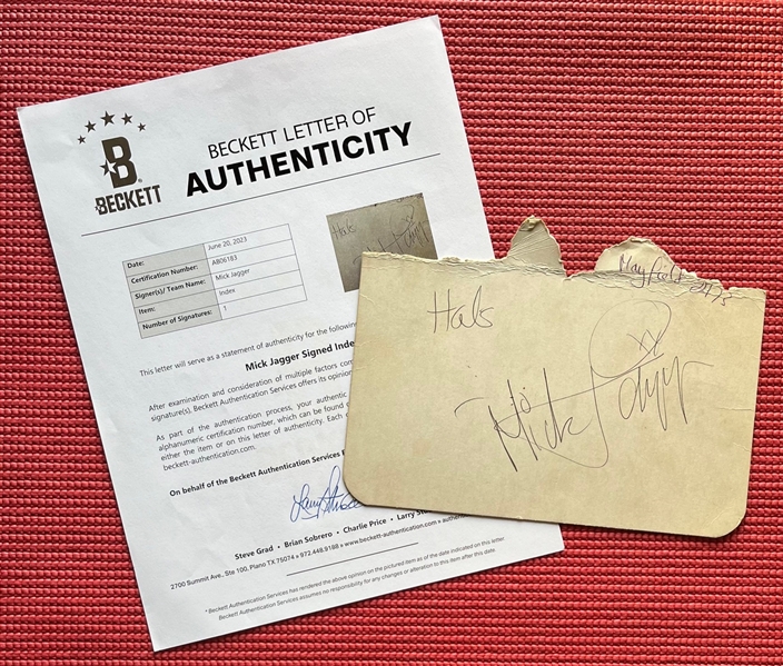Rolling Stones: Mick Jagger Signed 8.5" x 5" Cut (Beckett/BAS LOA)