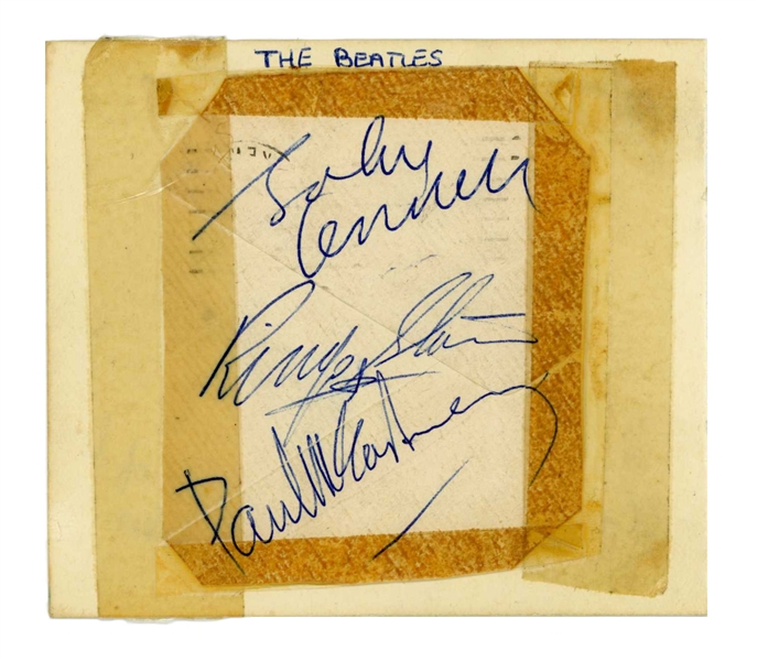 The Beatles: John Lennon, Paul McCartney, & Ringo Starr Signed Page (Tracks LOA)(Beckett/BAS LOA)