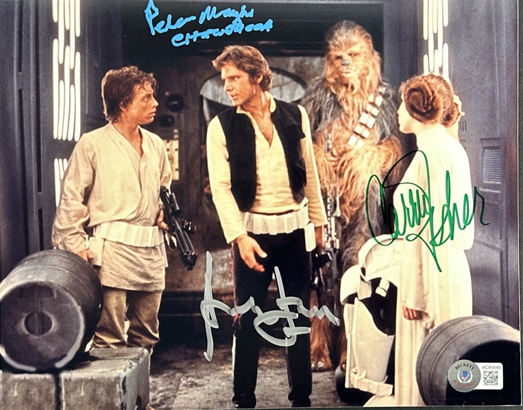 Star Wars: Harrison Ford, Carrie Fisher & Peter Mayhew Cast Signed Photo from "A New Hope" (Beckett/BAS LOA)