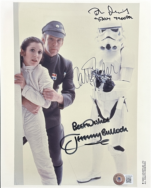 Star Wars: Carrie Fisher, Jeremy Bulloch & Peter Diamond Rare Cast Signed 8" x 10" Color Photo from "The Empire Strikes Back" (Beckett/BAS LOA)