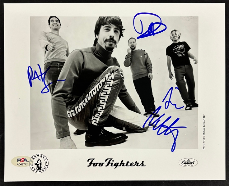 Foo Fighters: Group Signed 8" x 10" Promotional Photo (4/Sigs) (PSA/DNA)