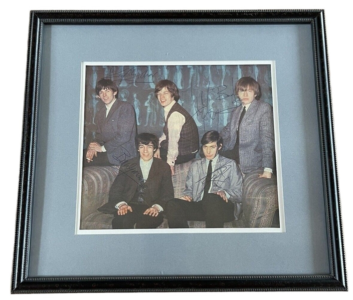 The Rolling Stones ULTRA RARE Vintage Group Signed Color Magazine Page Photograph (Beckett/BAS LOA)