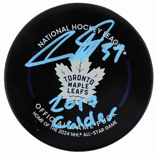 Auston Matthews Signed Official Maple Leafs NHL Hockey Puck with "2017 Calder" Inscription (Fanatics)(Beckett/BAS)