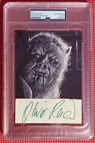 Oliver Reed Signed Vintage Cut w/ "The Curse of the Werewolf" Photo (PSA/DNA Encapsulated)