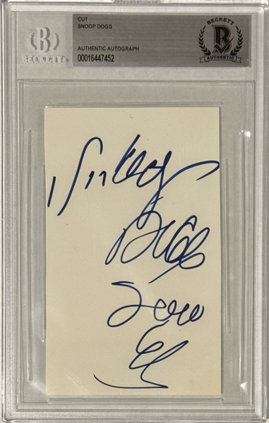 Snoop Dogg Signed 4 7/8" x 3" Page (Beckett/BAS Encapsulated & LOA)