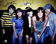 AC/DC: Group Signed 11" x 14" Photo (5 Sigs)(Beckett/BAS LOA)(Grad Collection)