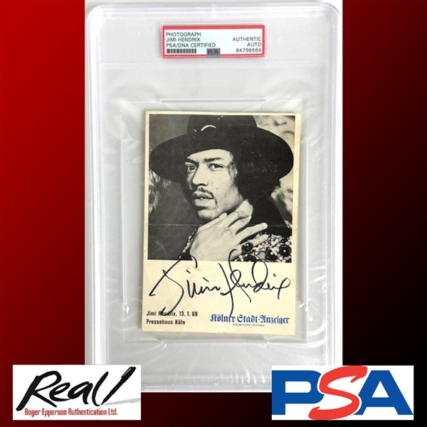 Rare Jimi Hendrix Signed 1969 Cologne Sporthalle Promo Photo Signed during his ONLY In-Store Autograph Session (PSA/DNA & Epperson/REAL)