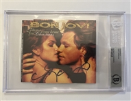 Cindy Crawford Signed Bon Jovi Christmas CD Insert (Beckett/BAS Encapsulated)