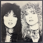 Ann & Nancy Wilson Signed Bébé le Strange Album (PSA/DNA)