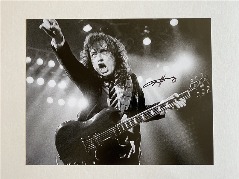 AC/DC: Angus Young Signed 11" x 14" Photo (JSA)(Ulrich Collection)