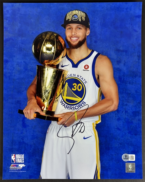 Steph Curry Signed 11" x 14" Color Photograph with Championship Trophy (Beckett/BAS LOA)