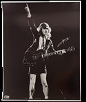 AC/DC: Angus Young Signed 16 x 20 B&W Photograph (Beckett/BAS LOA)