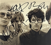 U2 Group Signed U2 By U2 Book Cover in Framed Display (3 Sigs)(Epperson/REAL LOA)