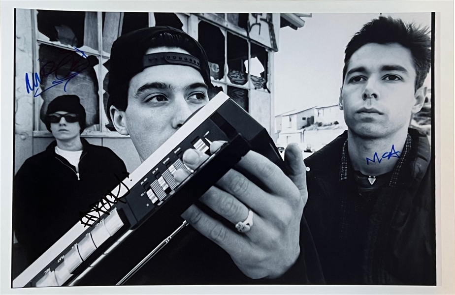 The Beastie Boys RARE In-Person Signed 12" x 18" Photograph with All 3 Members (Beckett/BAS LOA)