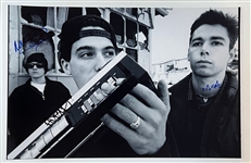 The Beastie Boys RARE In-Person Signed 12" x 18" Photograph with All 3 Members (Beckett/BAS LOA)
