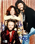 The Bee Gees Uncommon Group Signed 8" x 10" Color Photo with GEM MINT 10 Autographs! (Beckett/BAS LOA)